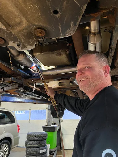 Technician working on a vehicle